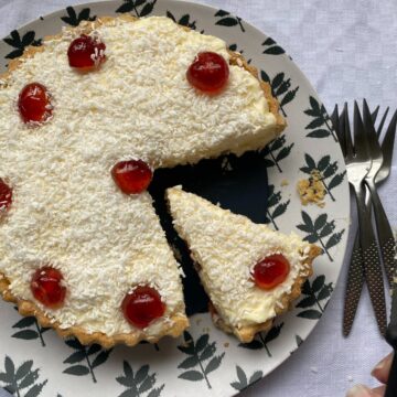Manchester Tart with a slice cut out.