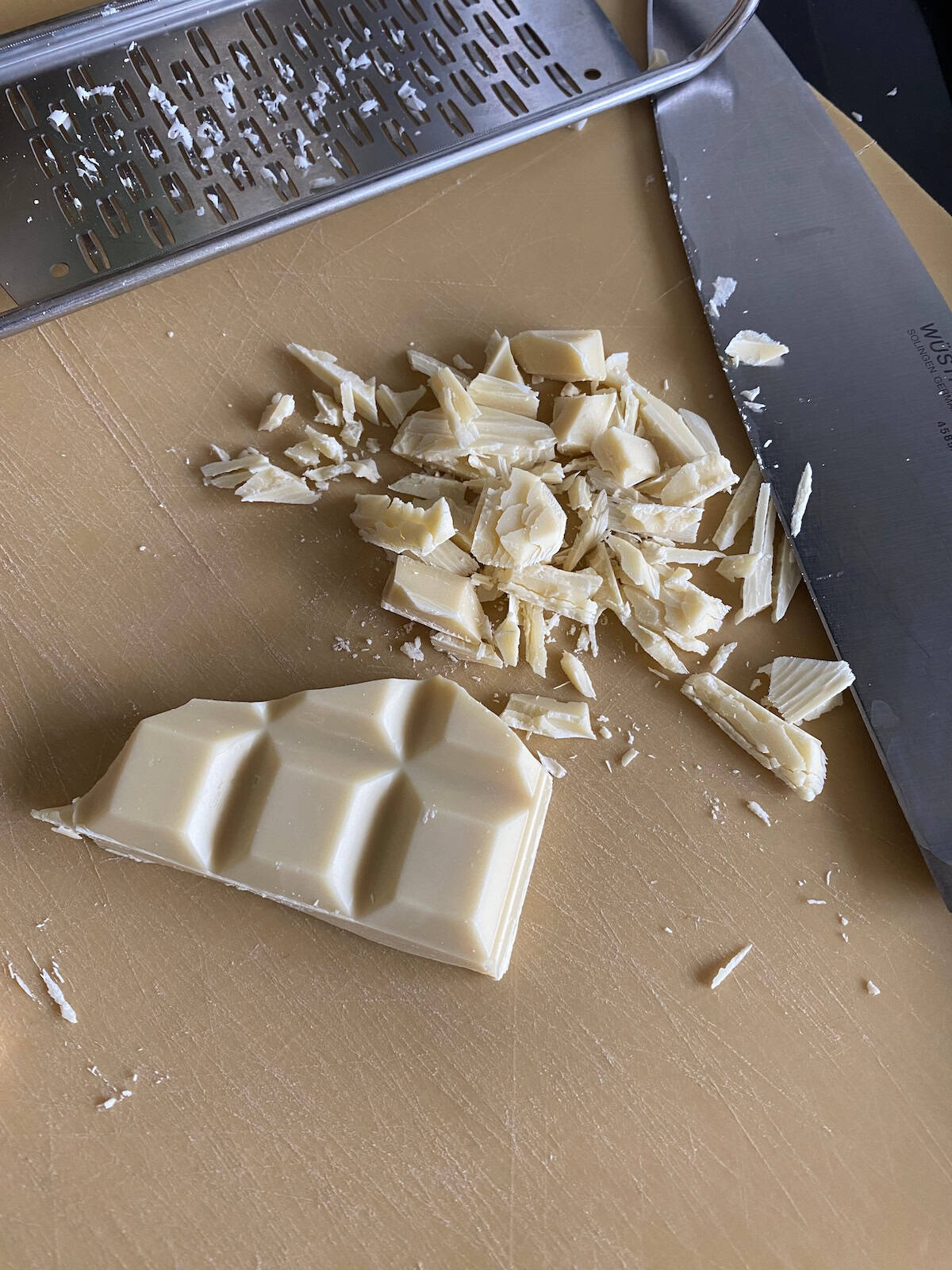 White chocolate cut into rough chunks.