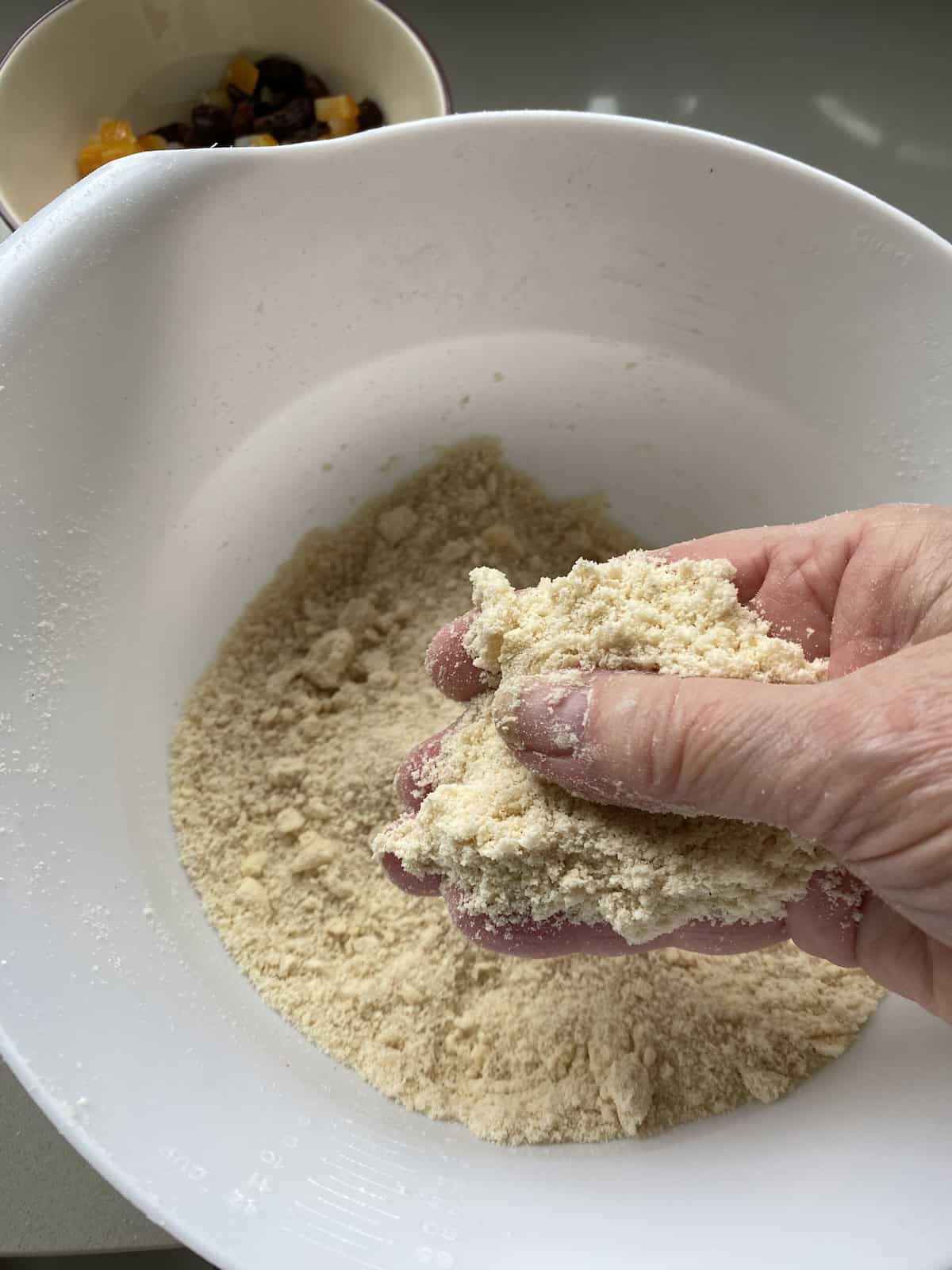 Flour, salt, sugar and spices in a large white mixing bowl.